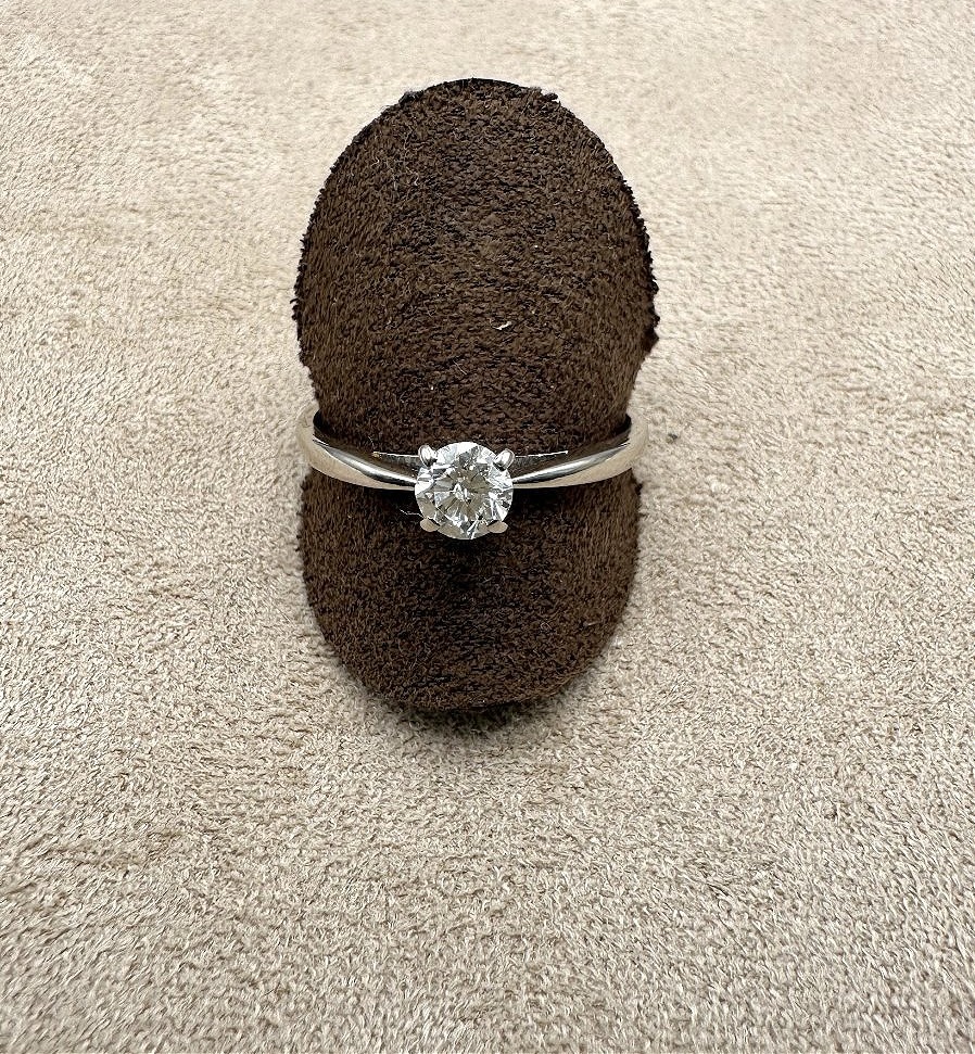 750-thousandths White Gold Diamond Solitaire Ring.