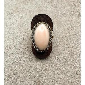 Yellow Gold Ring Featuring A Cabochon-cut Coral As The Centerpiece