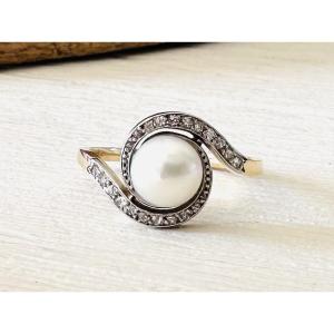 Bague "Tourbillon" en or jaune 18K avec perle blanche et petits diamants