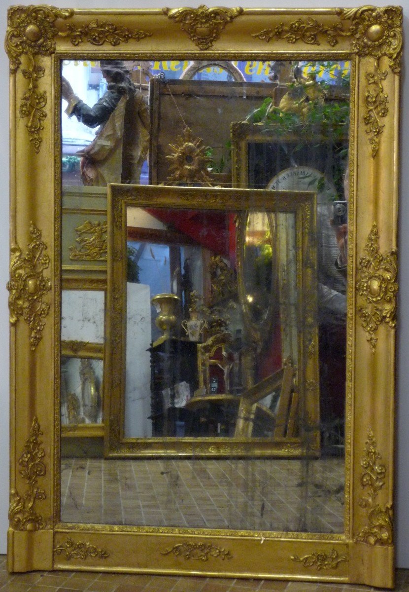 Miroir d'époque Restauration début 19e siècle en bois doré 
