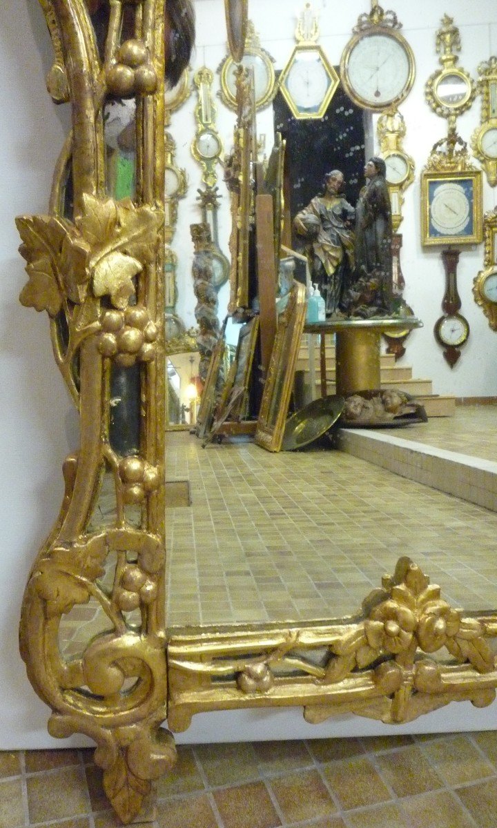 Miroir d'époque Louis XV en bois sculpté et doré -photo-3