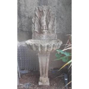 Fontaine murale en pierre 