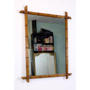 Important miroir en bois sculpté imitation bambou, XXe siècle - 102 x 75 cm
