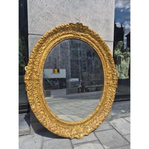 Oval Gilded Wood Mirror, 18th Century.