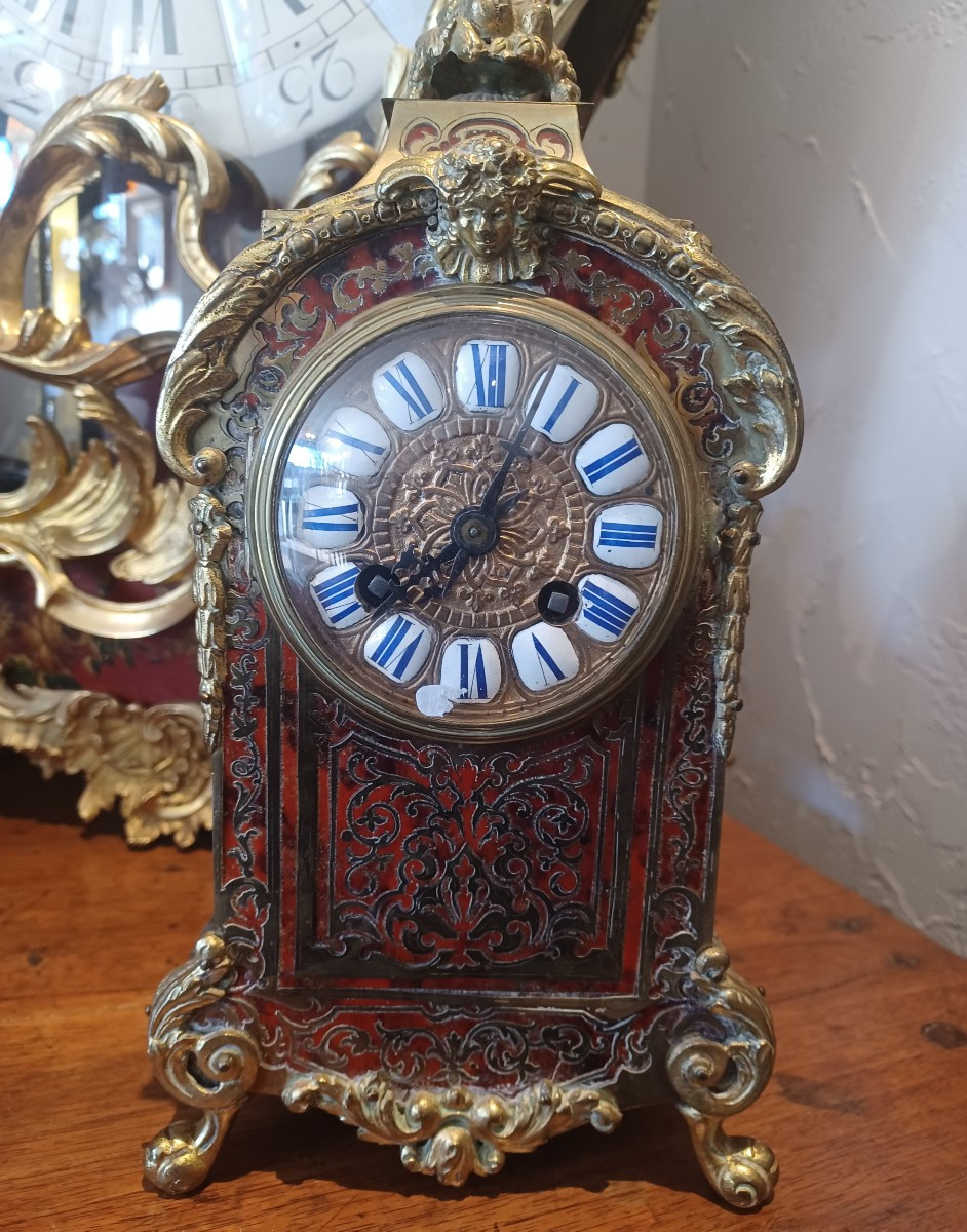 Pendule de cheminée , Boule en marqueterie bronze