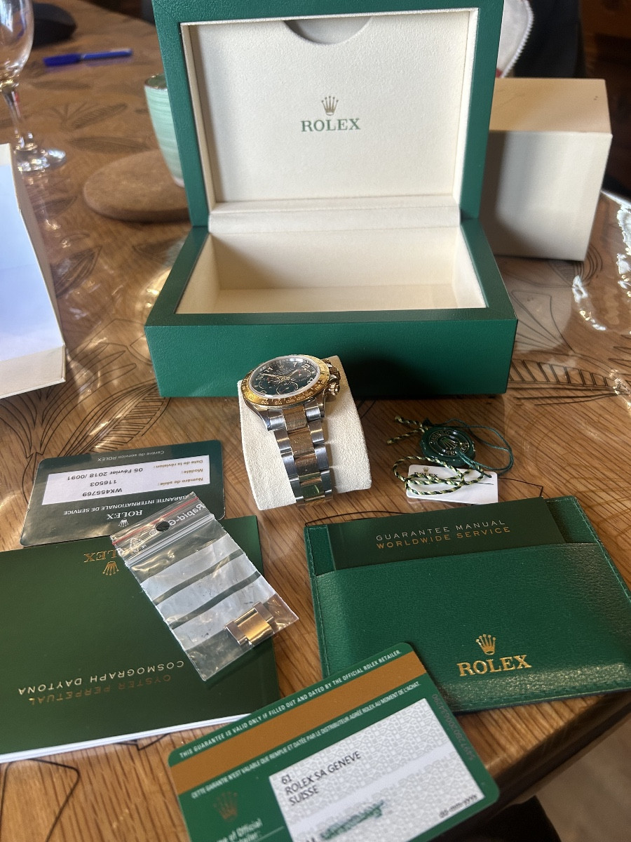 Montre rolex Oyster Daytona bleu racing full set boîte papier 116523