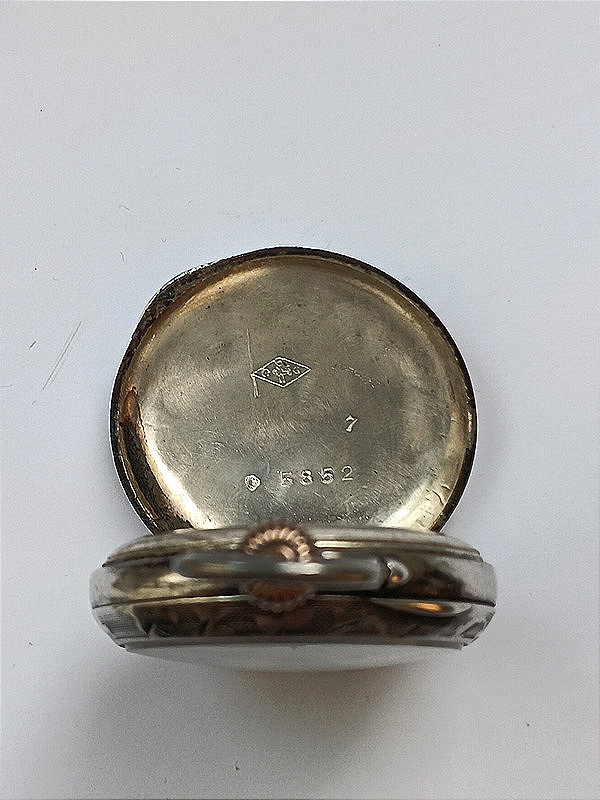 Montre à gousset pour femme en argent et vermeil à décor floral ciselé-photo-4