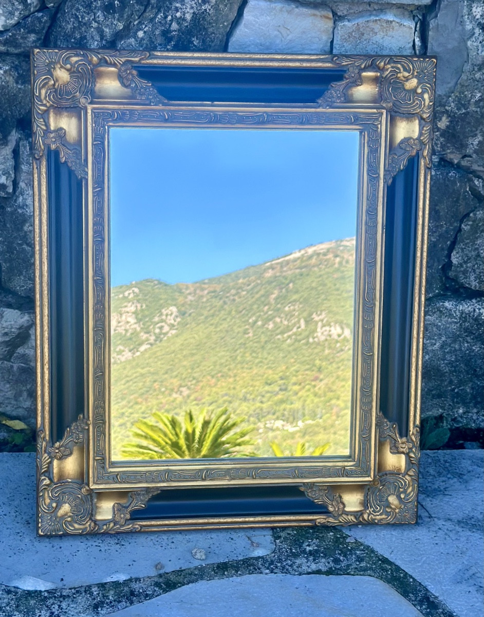 Miroir Baroque à poser ou à suspendre en bois doré sur fond noir 