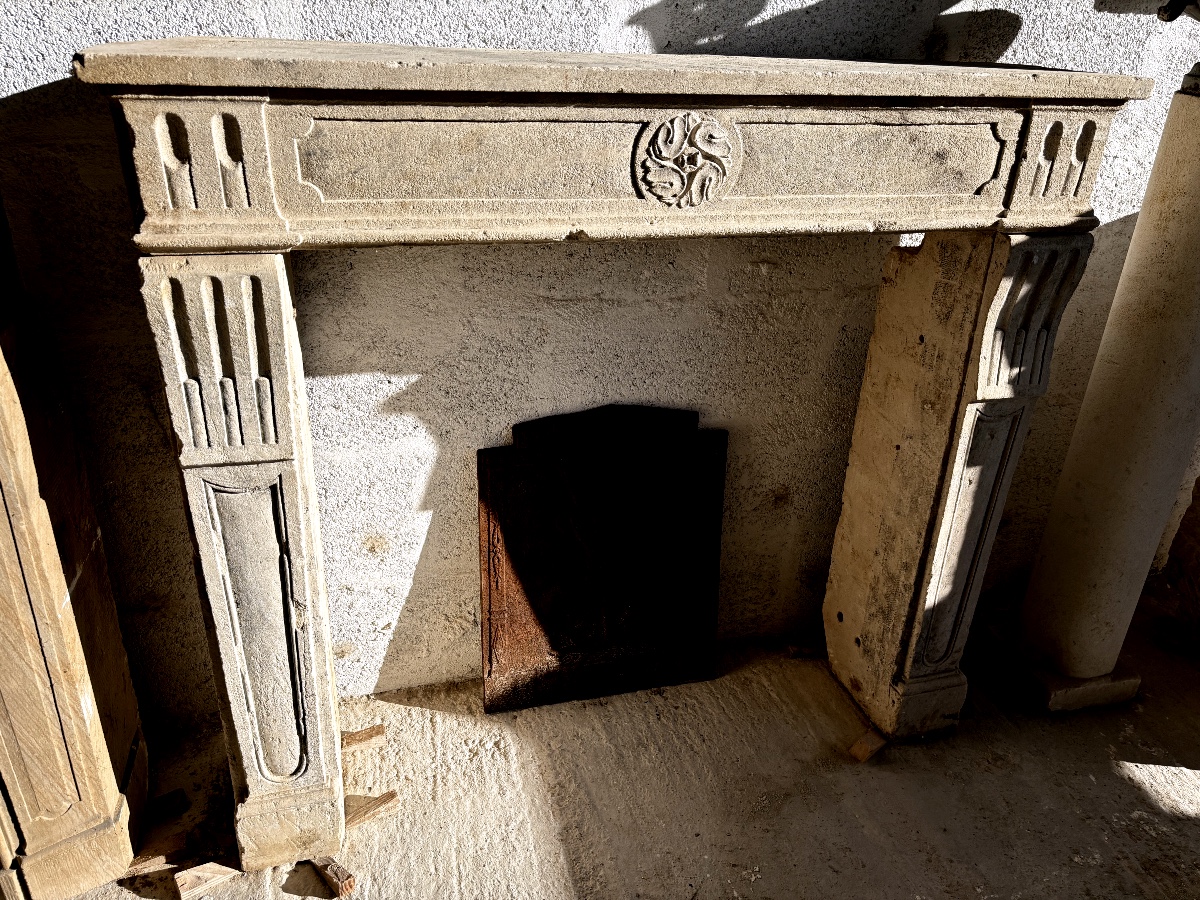 Louis XVI Style Limestone Fireplace
