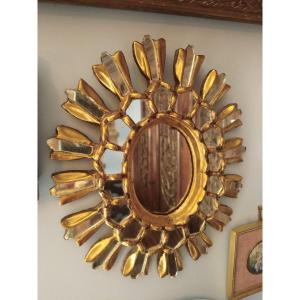 Sun-shaped Mirror Made Of Gilded Wood And Mirror Shards—in The Style Of Line Vautrin