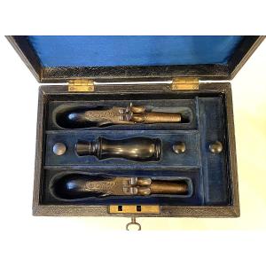 Boîte de pistolets à coffre