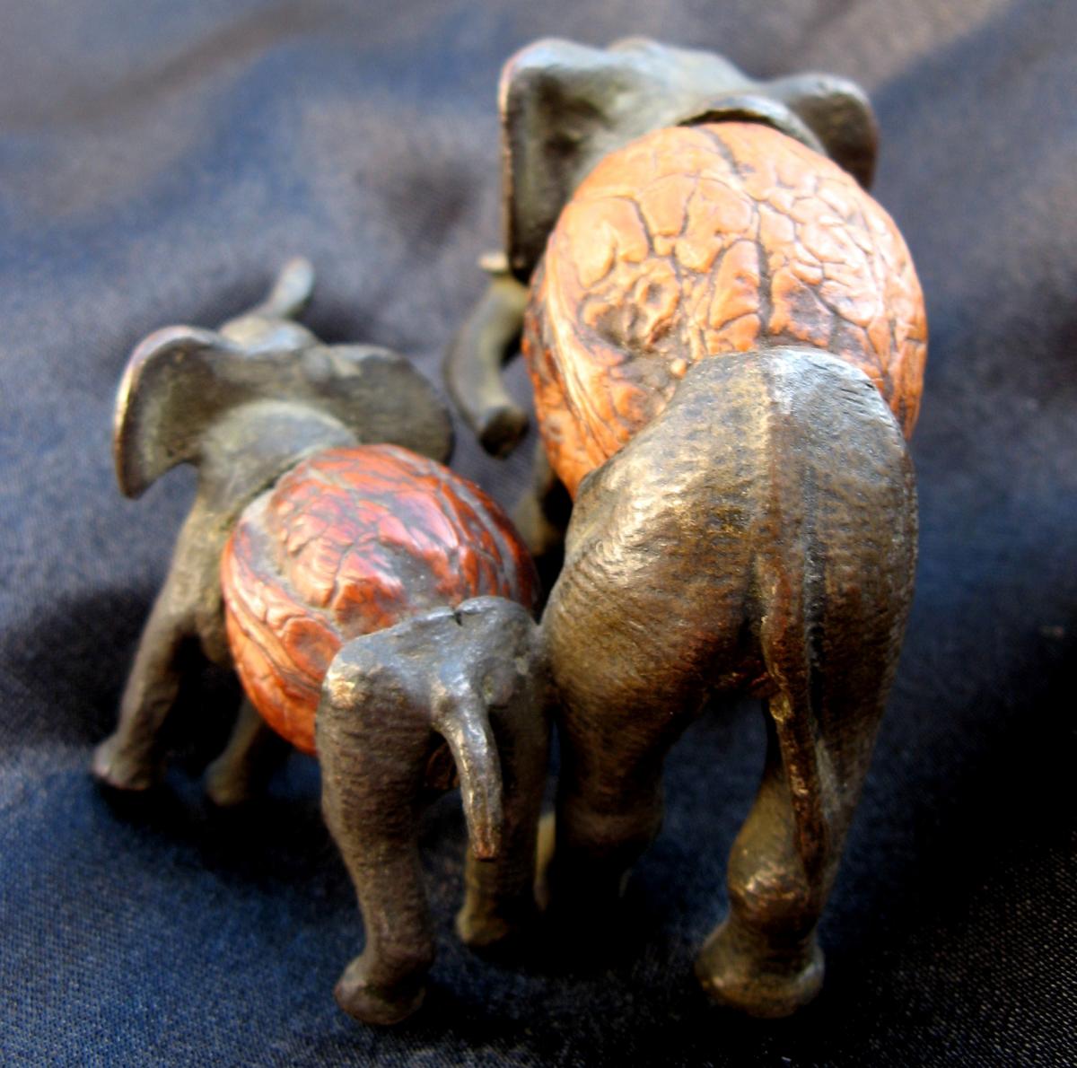 Bronze And Nuts : Elephant And Its Small-photo-1