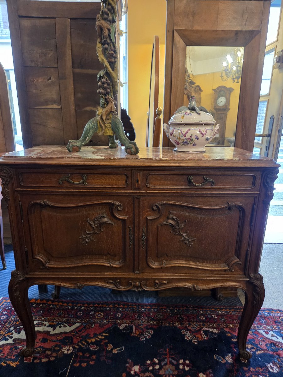 A Carved Oak Sideboard In The Louis XV Style From The Late 19th Century.