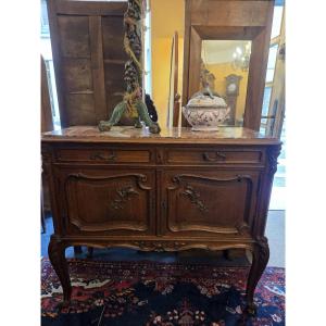 A Carved Oak Sideboard In The Louis XV Style From The Late 19th Century.