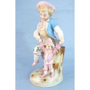 PORCELAINE  vers 1880  GARCON AU POLICHINELLE  