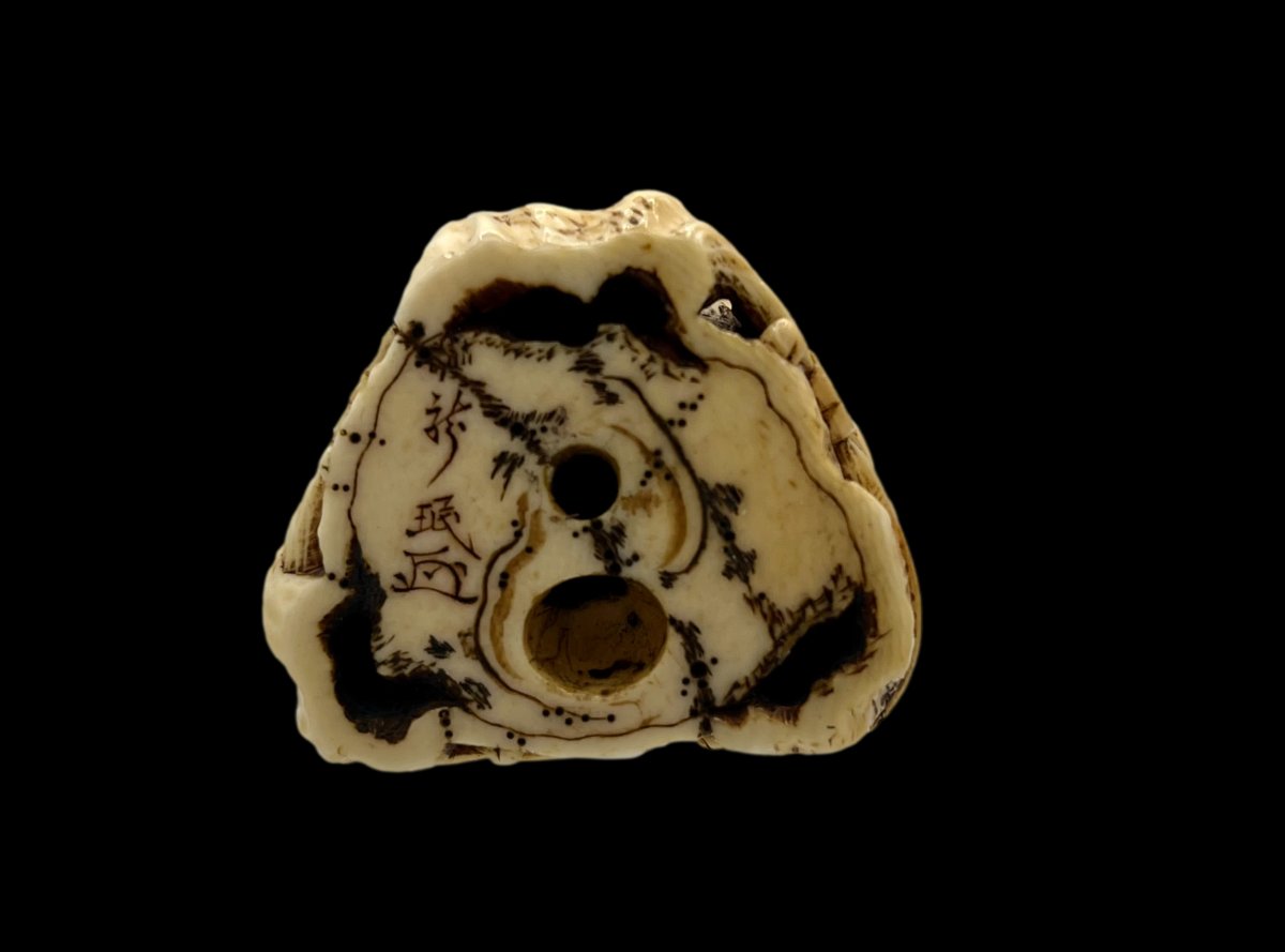 Netsuke man in a tree-photo-1