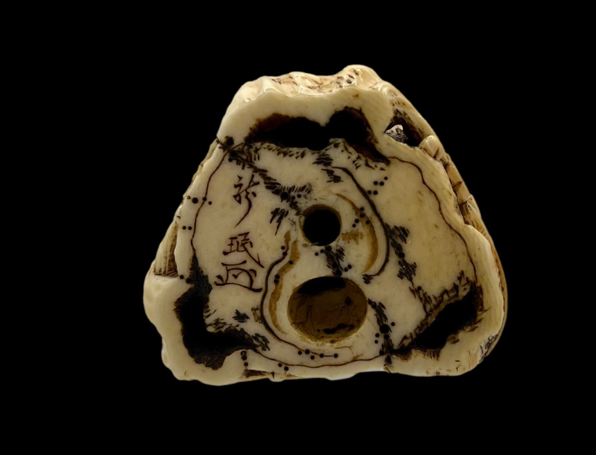 Netsuke man in a tree-photo-2