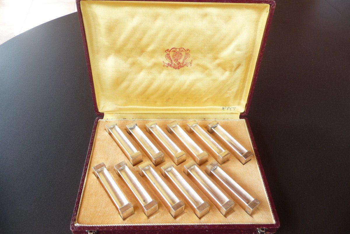 12 Art Deco Knife Holders, In Silver Metal In Original Box, Circa 1930.