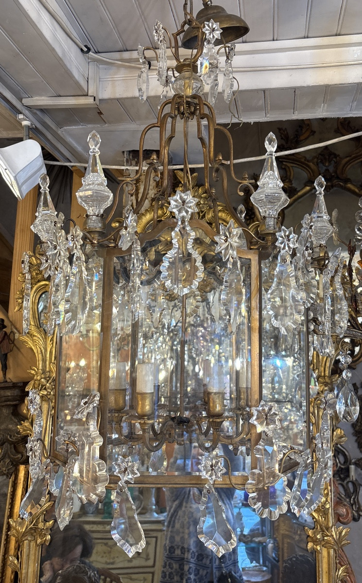 Lanterne de style Louis XV 6 lumières à 6 pans  bronze  habillée de pampilles et poignard 