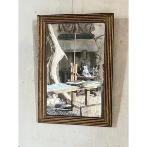 Miroir cannelé doré
