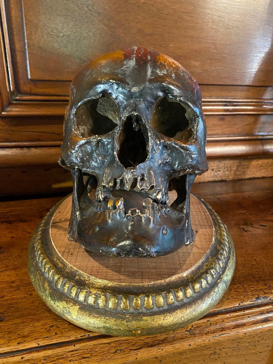 Realistic Skull In Tribal Painted Terracotta, On A Golden Wooden Base-photo-7