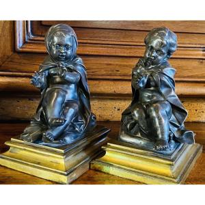 Paire d'enfants en bronze argenté - Allégorie de "'Hiver, époque Restauration