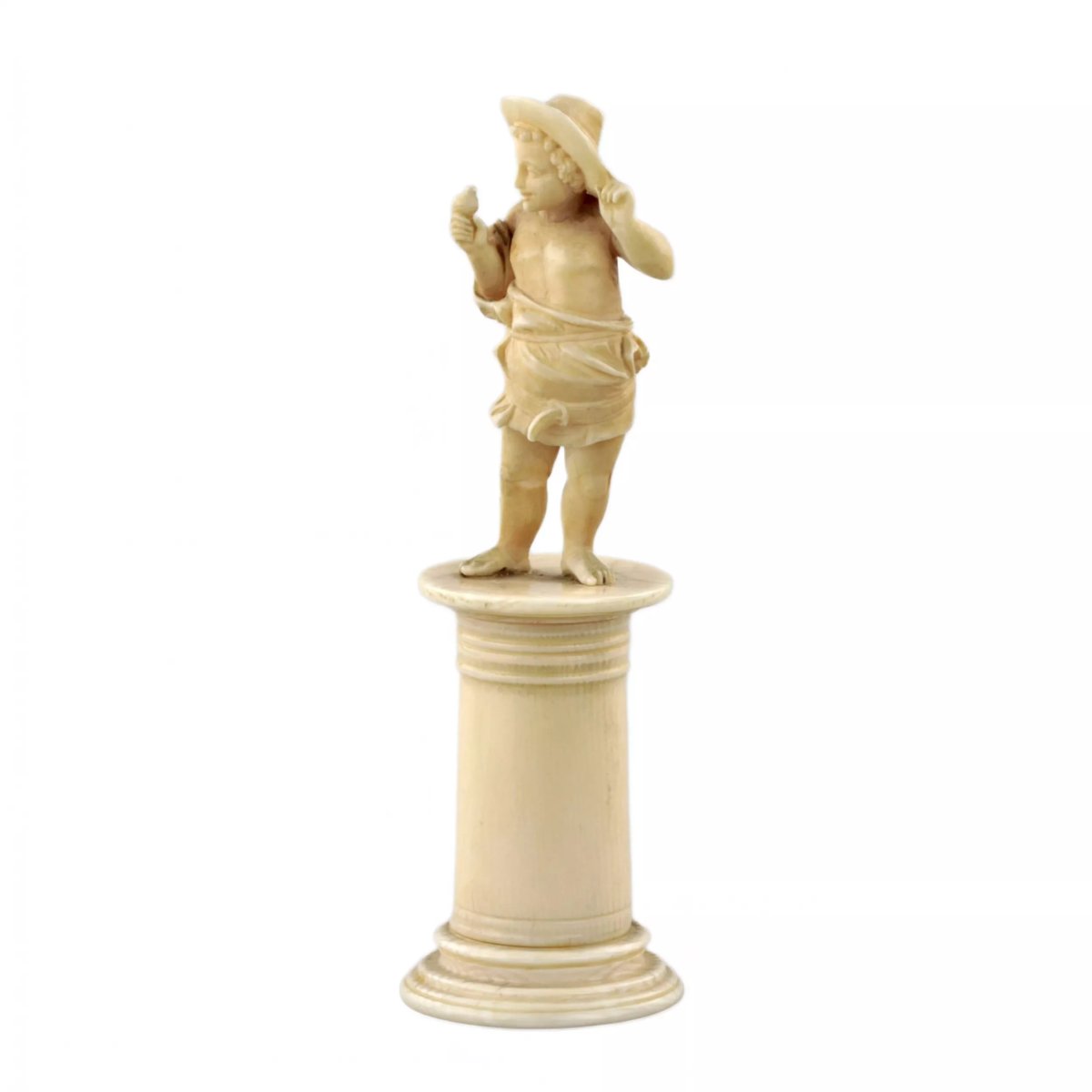 Figurine en ivoire sculpte dun garçon avec un oiseau des annees 1800.
