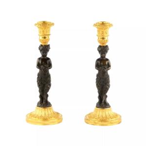 PAIRE DE BOUGEOIRS EN BRONZE « FAUNES ». FRANCE. MILIEU DU XIXe SIÈCLE