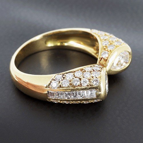 Bague en or jaune 750‰ présentant 2 diamants taille poire réhaussé de diamants baguette -B10227-photo-2