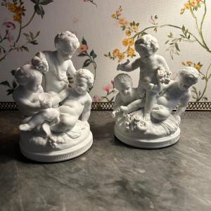 Pair Of Biscuit Groups Figuring 3 Putti Embodying The Seasons