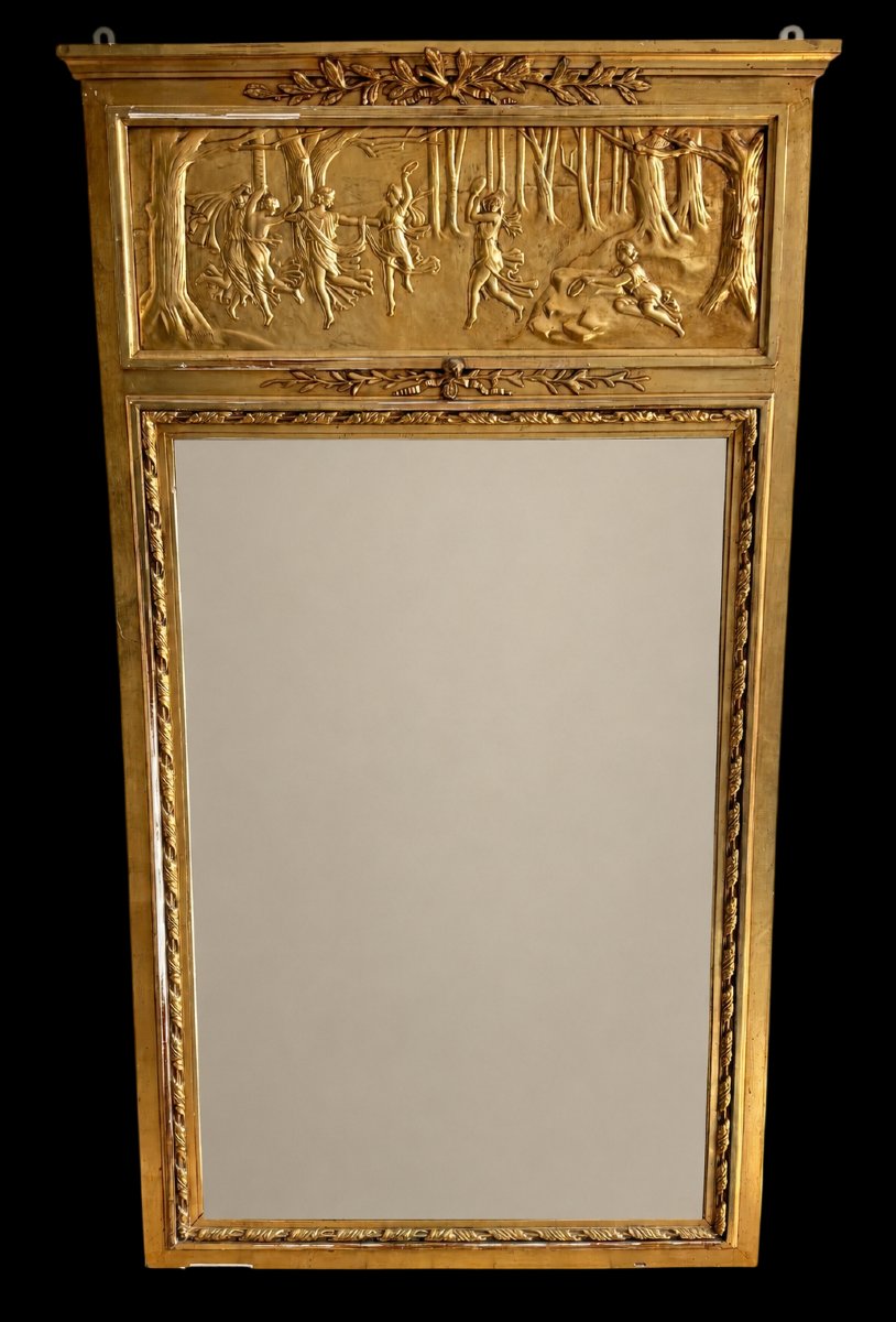 A Gilded Louis XVI-style Trumeau With Unusual Decorations. 