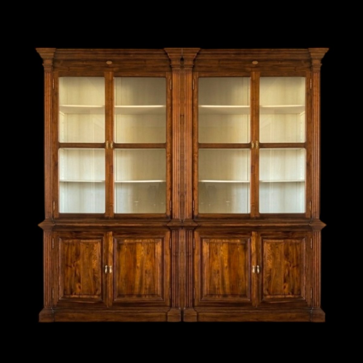 Paire de bibliothèques / vaisseliers en teck de style colonial 