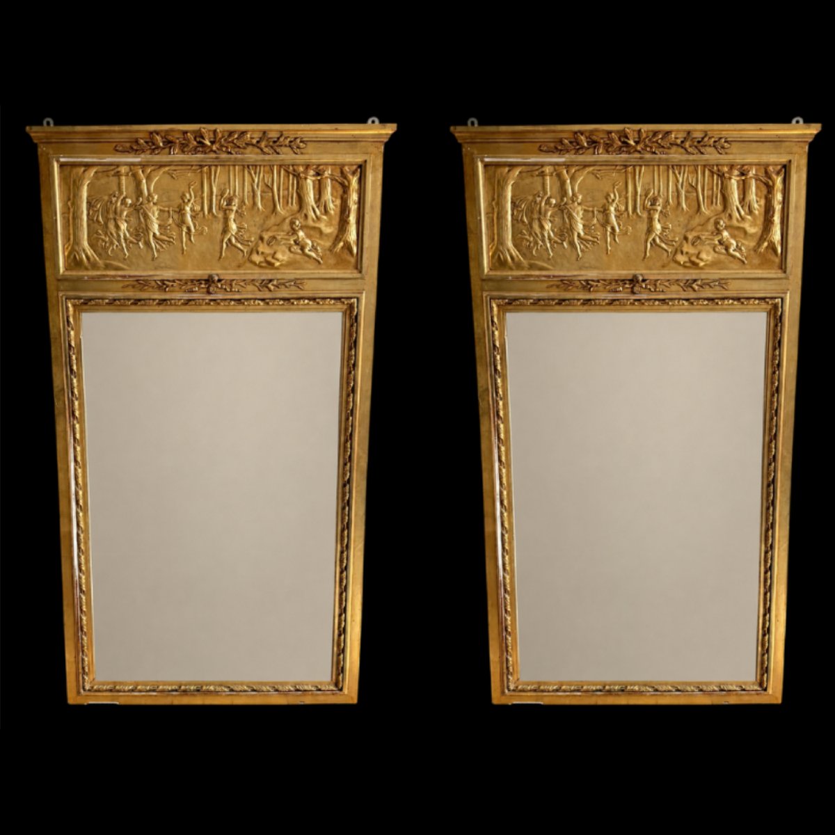 Paire de Trumeaux dorés de Style Louis XVI