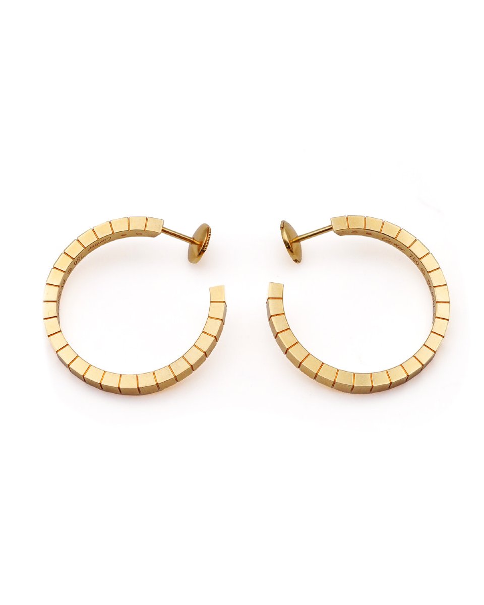 Boucles d'oreille créoles Cartier modèle Lanière en or 18 karats-photo-3