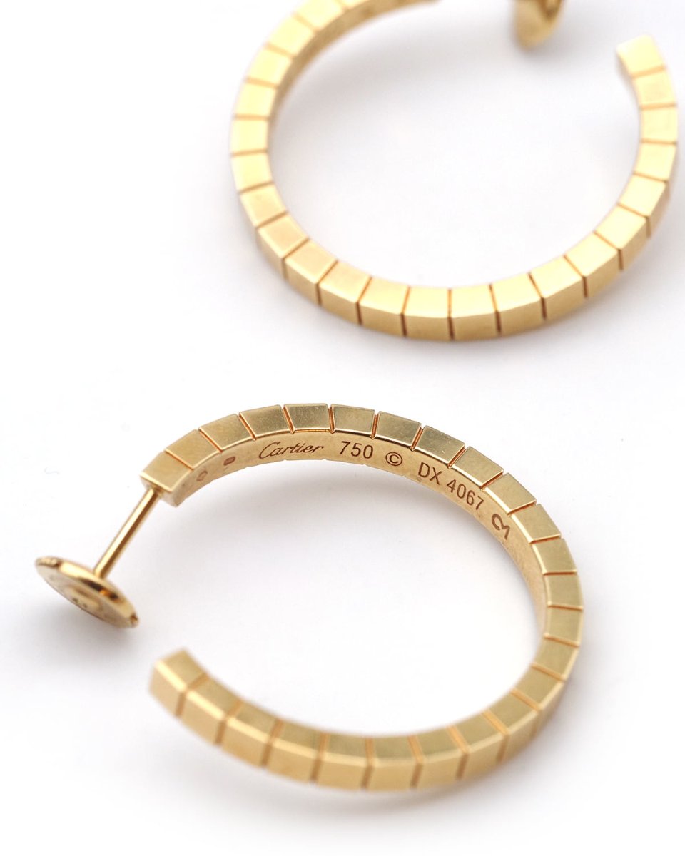 Boucles d'oreille créoles Cartier modèle Lanière en or 18 karats-photo-4