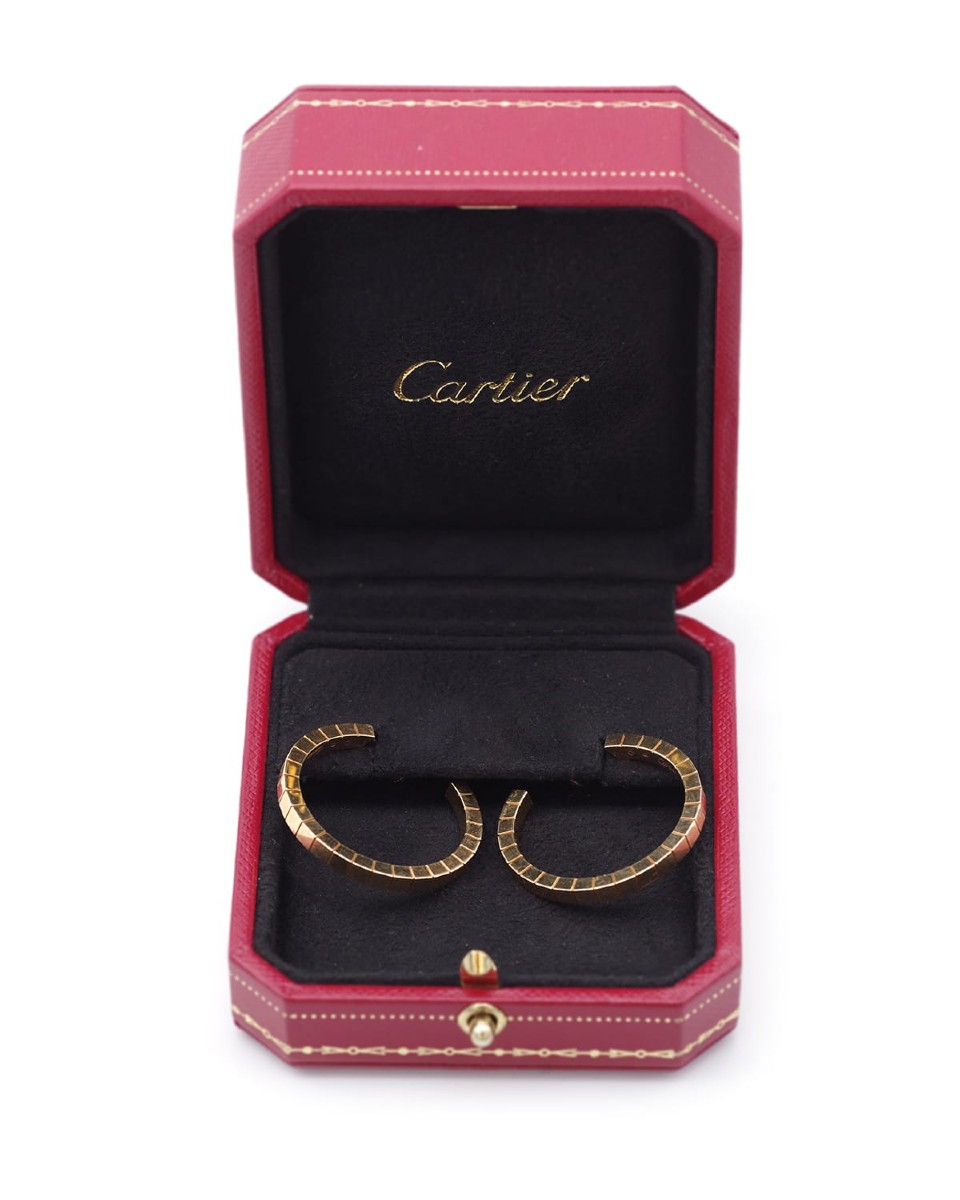 Boucles d'oreille créoles Cartier modèle Lanière en or 18 karats