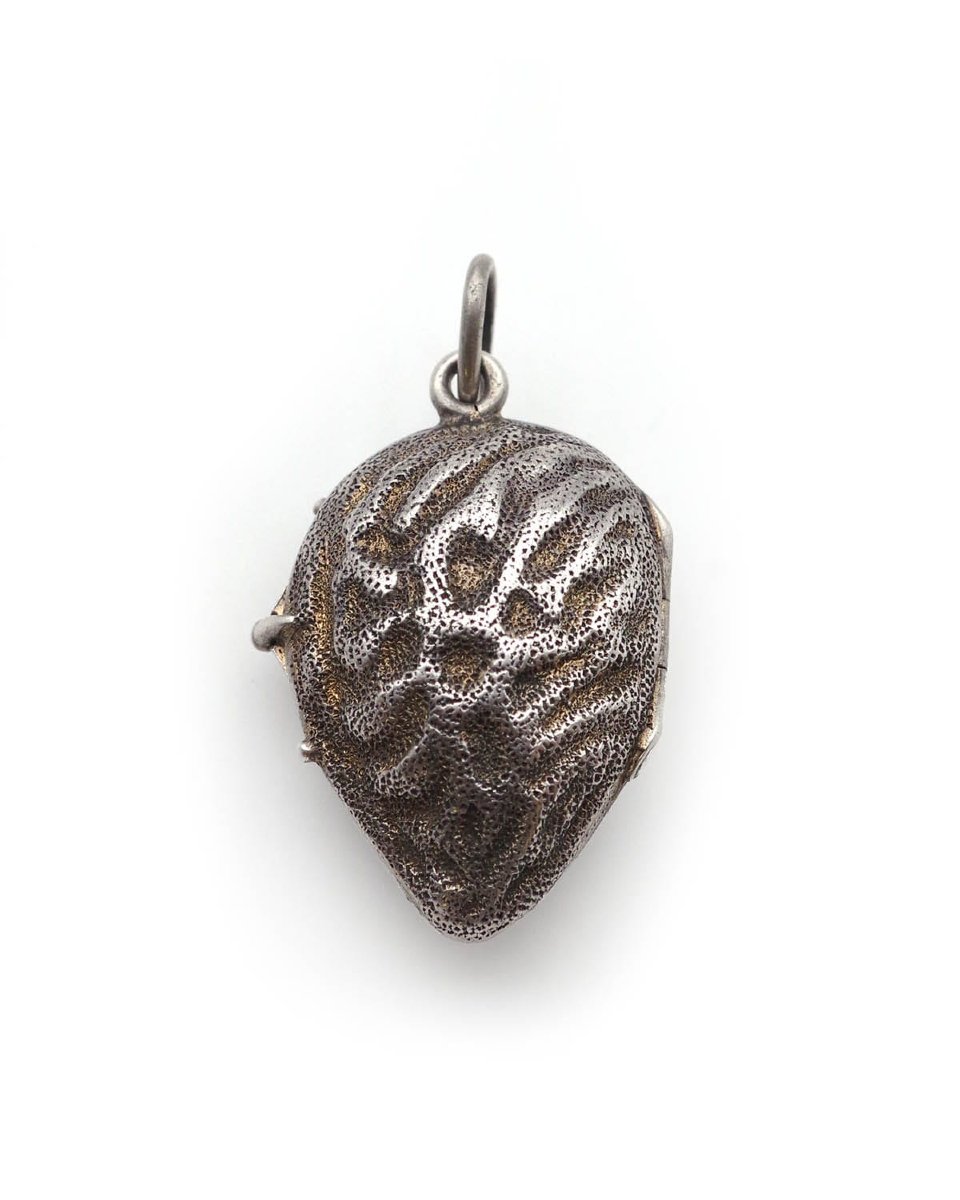 Pendentif médaillon amande ouvrant en argent doré -photo-1