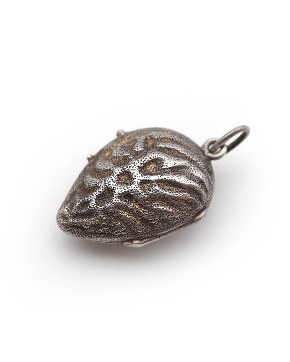 Pendentif médaillon amande ouvrant en argent doré 