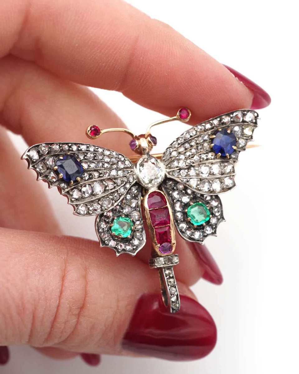 Broche ancienne papillon diamants en or 18 karats et argent