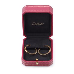 Boucles d'oreille créoles Cartier modèle Lanière en or 18 karats