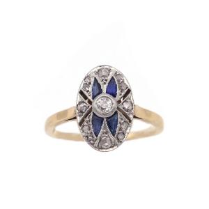 Bague Art Deco ovale saphirs en or 18 karats et platine 