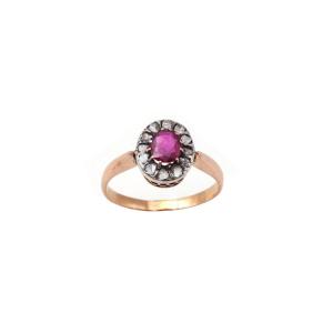 Bague marguerite rubis diamants en or 18 karats