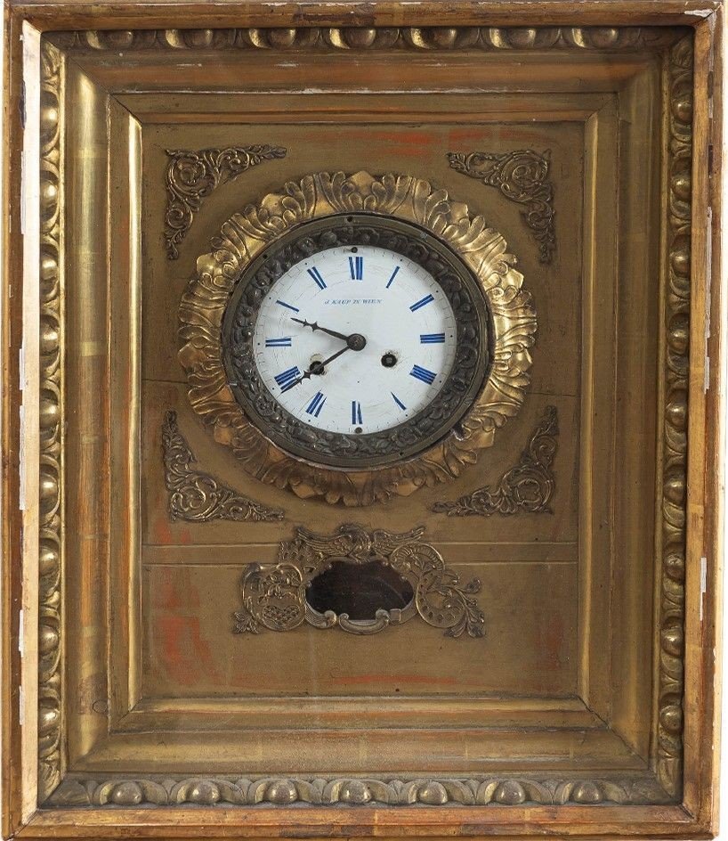 Clock In Gilded Wood