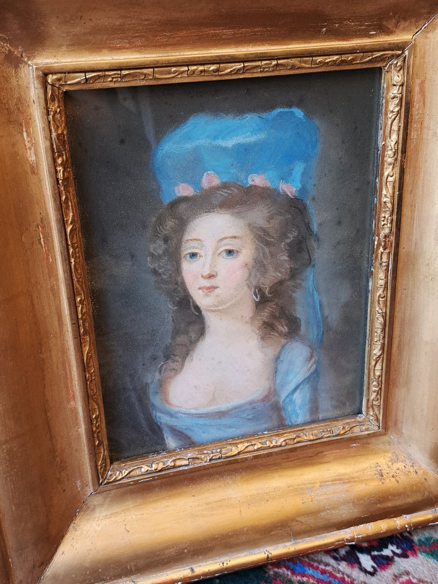 Portrait Of A Young Woman With A Blue Bow-photo-2
