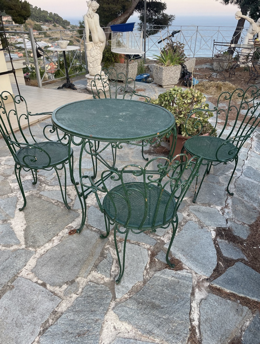 Wrought Iron Table And 4 Garden Chairs