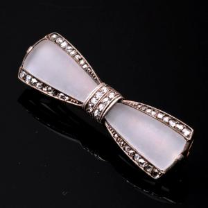 Broche « nœud papillon » Art Déco en or, diamants et cristal amati