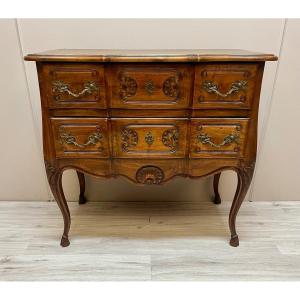 commode sauteuse en noyer de style Louis XV 