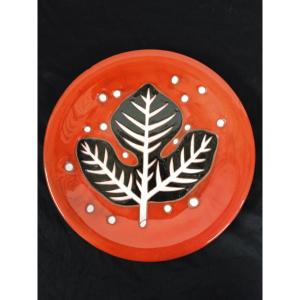 Picart le Doux ( 1902  1982 )assiette  feuille de figuier sur un fond orangé nuancé