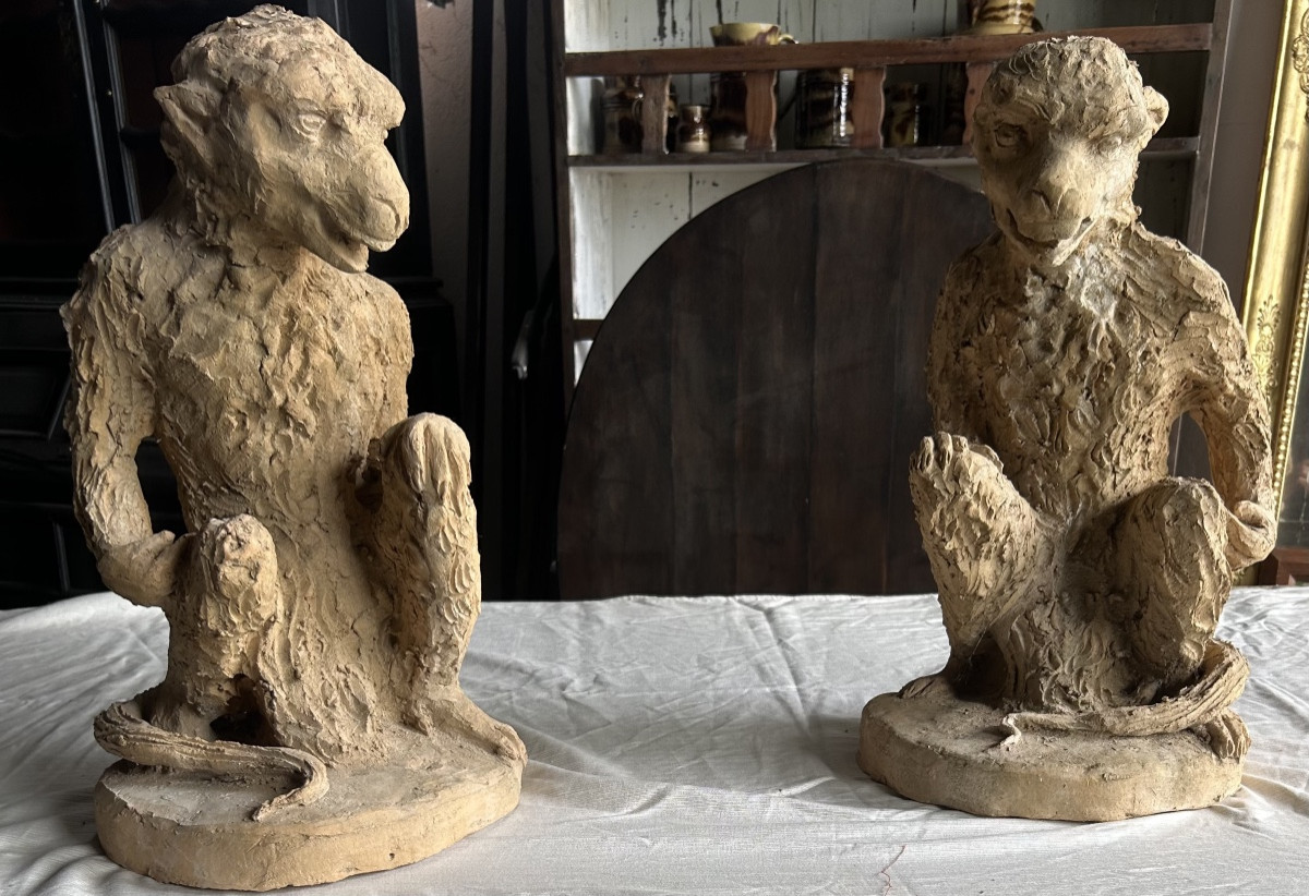 Paire de singes en terre cuite