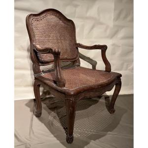 Fauteuil d’époque Louis XV canné